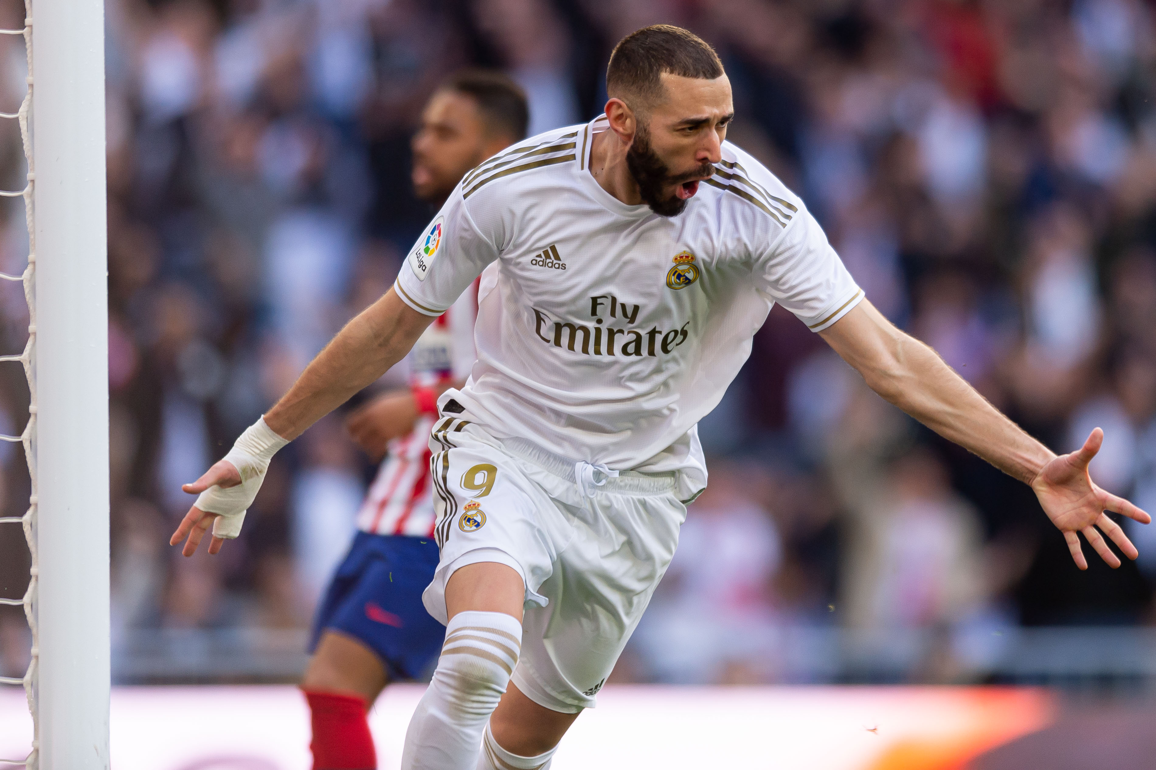 Karim Benzema celebrates after scoring for Real Madrid against Atletico in February 2020.