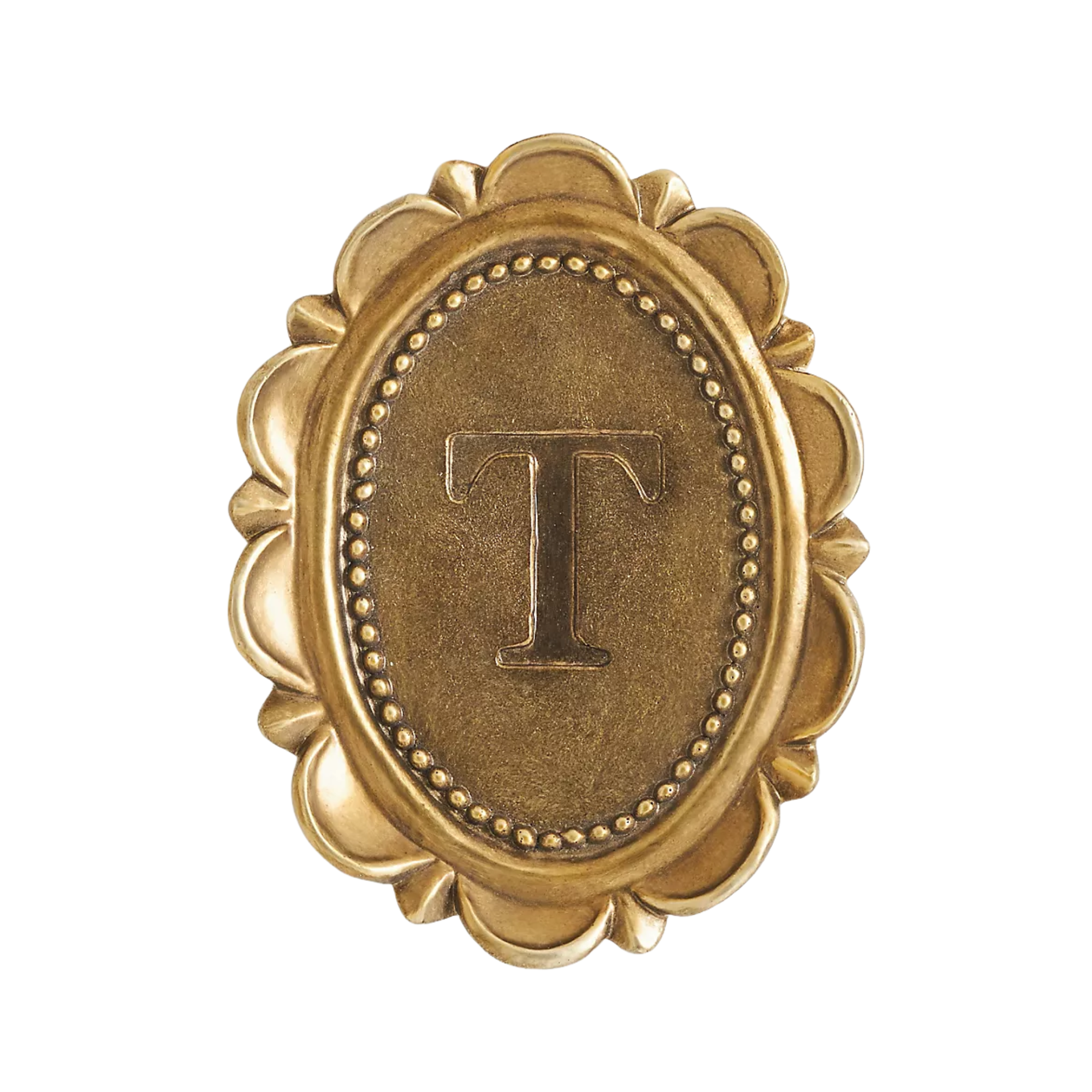 a decorative wall charm with the letter 'T'
