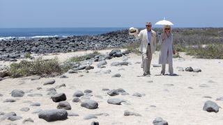 King Charles and Queen Camilla on the beach on the Galapagos Islands