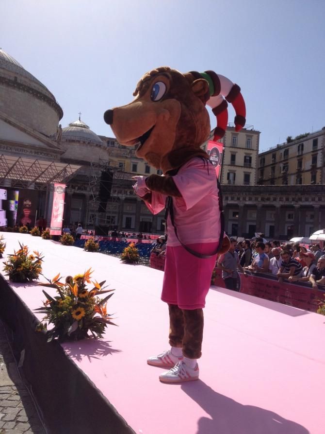 The Giro dItalias mascot, Girbecco - a mountain goat - was out to whip up the crowds with his antics before the riders appeared on the stage in Naples