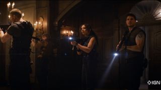 STARS operatives including Jill and Chris as they enter a mansion hallway, weapons are raised and torches are on