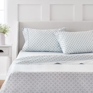 Martha Stewart 100% Cotton Bed Sheets on a bed.