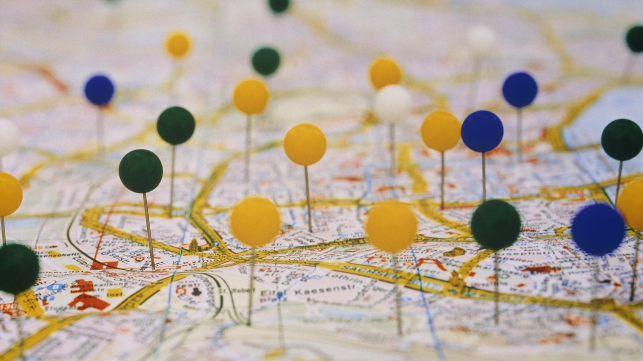 A roadmap has multiple pins marking places of interest.