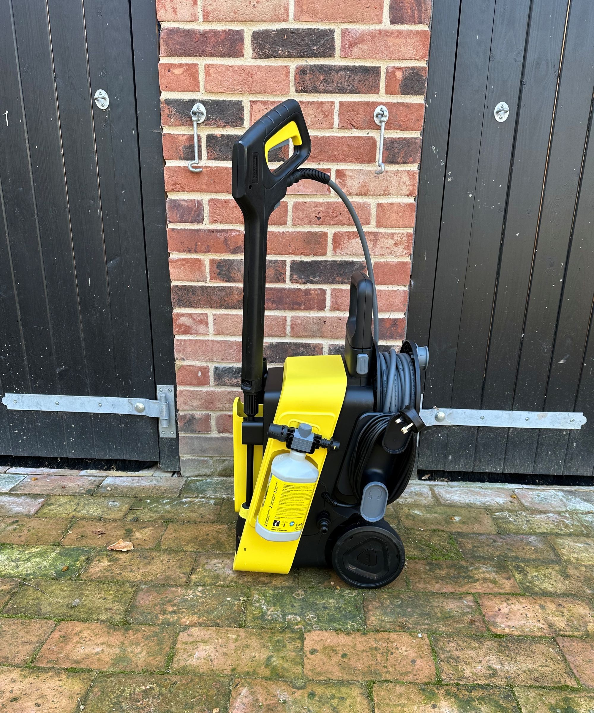 A yellow Karcher K5 comfort premium pressure washer after unboxing and assembling