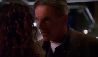 JAG Mark Harmon talking with a fellow agent