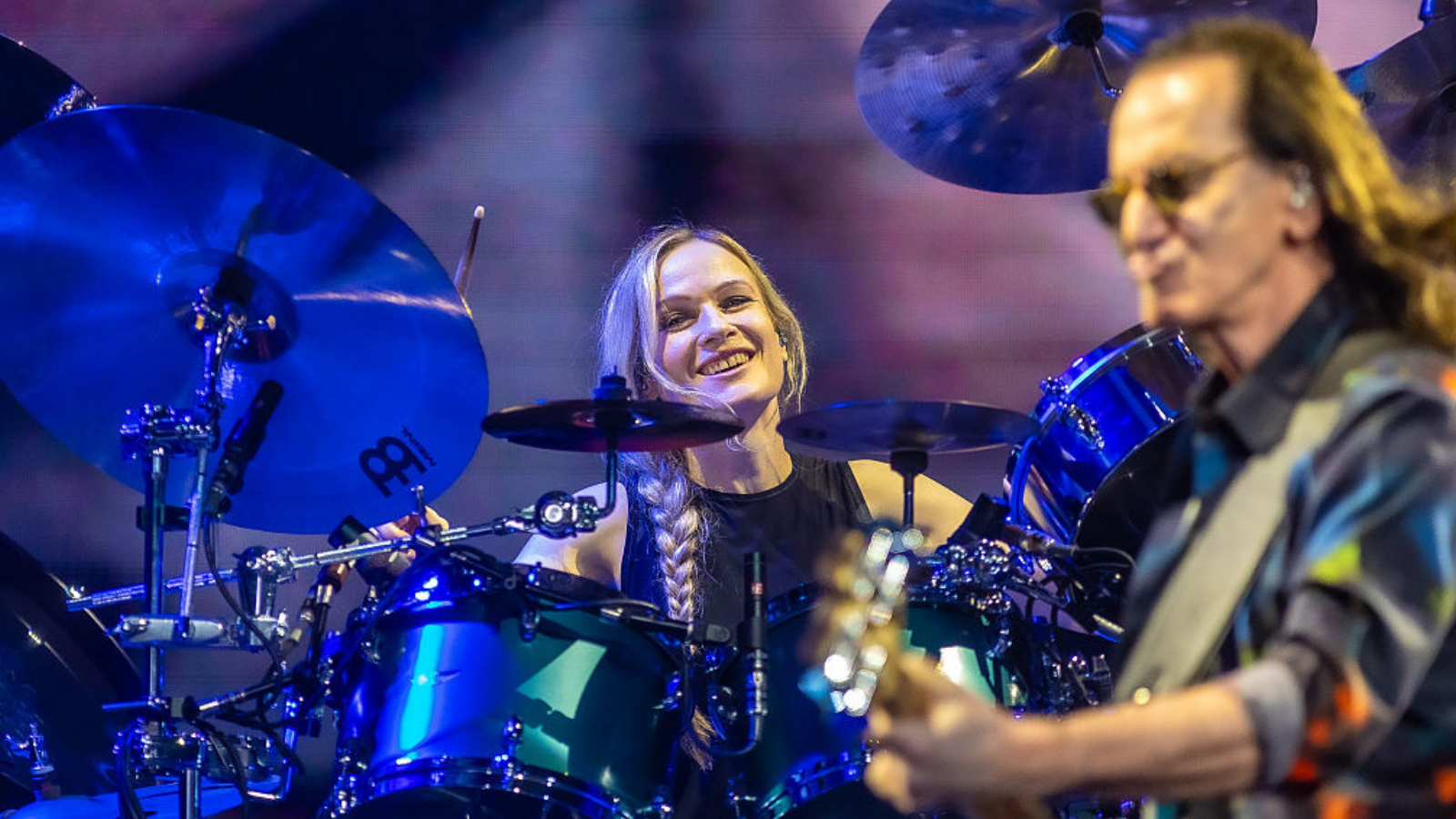 Anika Nilles and Geddy Lee of Rush perform in concert during the "Rush: Fifty Something" tour at Dickies Arena on July 11, 2026 in Fort Worth, Texas.