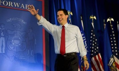 Wisconsin Governor Scott Walker strides onstage to make his acceptance speech after winning the gubernatorial recall election: Walker's win demonstrates just how important swing voters are.