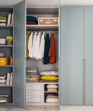 closet with hanging space and shelves