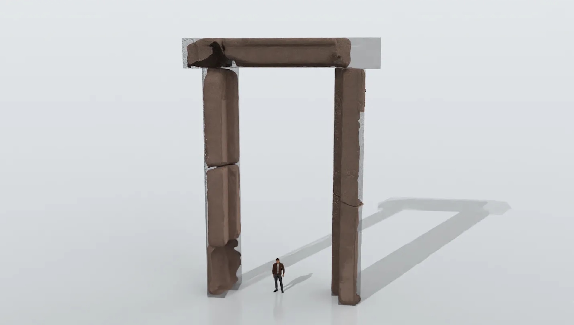 a digital rendering of a massive square stone archway with a person for scale