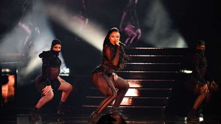 In this image released on November 22, Megan Thee Stallion performs onstage for the 2020 American Music Awards at Microsoft Theater on November 22, 2020 in Los Angeles, California. 