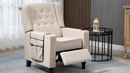 Reclining chair in a cream color sitting in a room