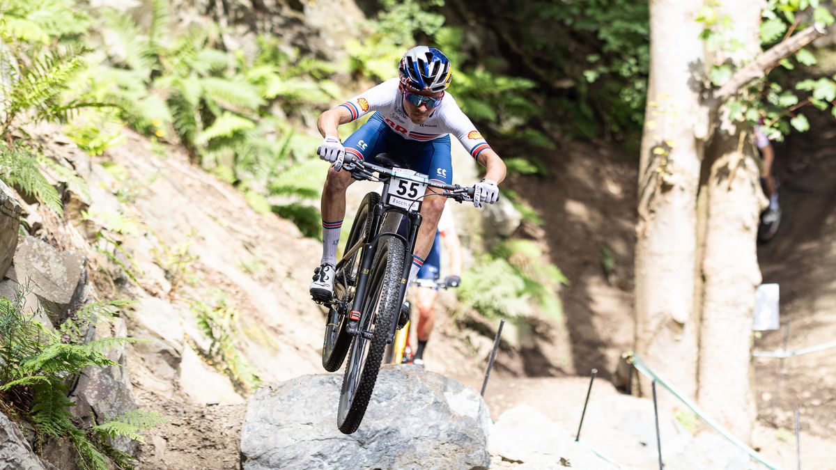 Tom Pidcock on the feature jump at Glentress