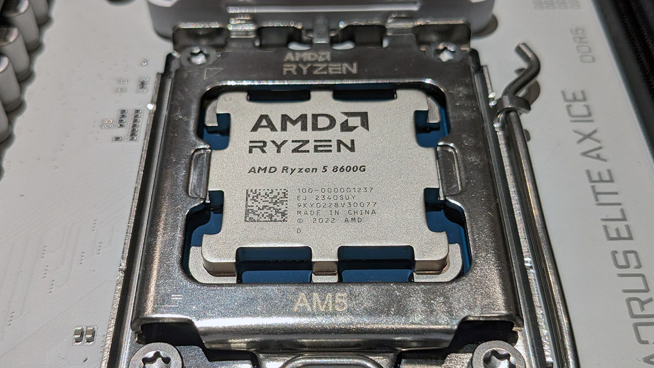 AMD Ryzen 5 8600G inserted into a motherboard