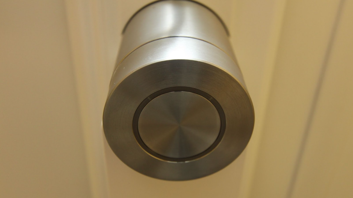 Close-up of Ultion Nuki Plus smart lock fitted on a front door