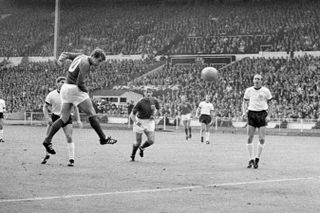 Geoff Hurst equalises with a header for England against West Germany in the 1966 World Cup final at Wembley