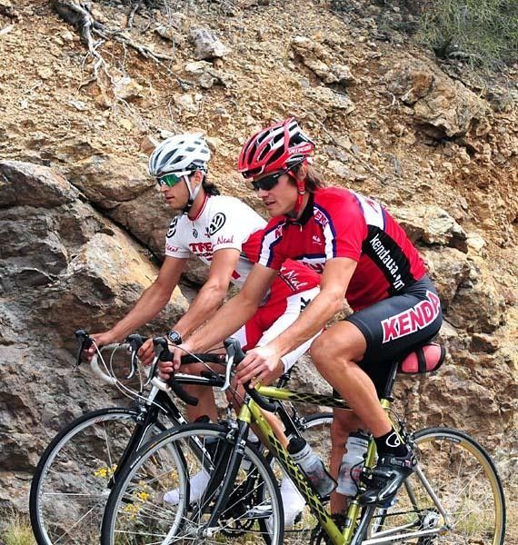 Andy Schultz (Kenda/Titus) and Adam Morka (Trek Bicycle Store) climb the pass.