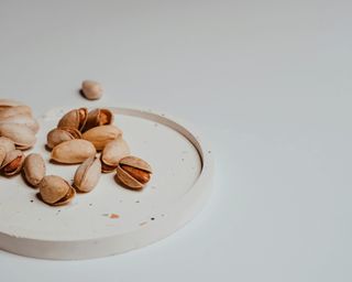 a coaster being used to hold a snack