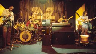 Photo of Joseph SAMPLE and Robert POWELL and Nesbert HOOPER and Wilton FELDER and Larry CARLTON and Larry CARLTON and CRUSADERS, Wilton Felder, Nesbert Hooper, Joseph Sample, Robert Powell (back on bass), Larry Carlton performing live onstage