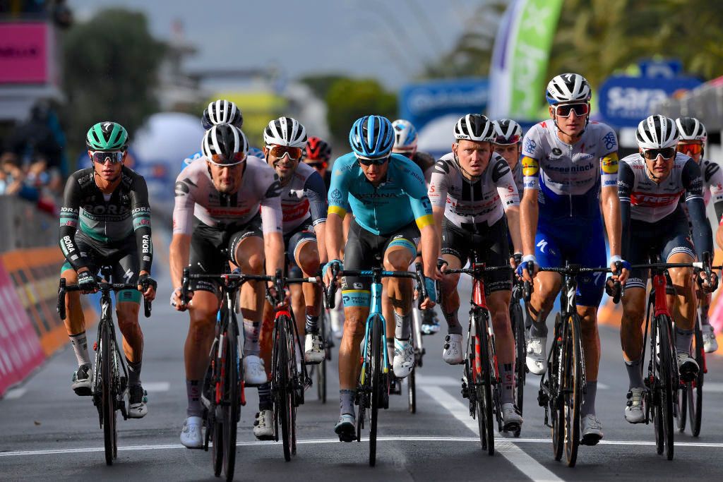 TORTORETO, ITALY - OCTOBER 13: Arrival / Matteo Fabbro of Italy and Team Bora - Hansgrohe / Nico Denz of Germany and Team Sunweb / Jacopo Mosca of Italy and Team Trek - Segafredo / Jakob Fuglsang of Denmark and Astana Pro Team / Sam Oomen of The Netherlands and Team Sunweb / Mikkel Honore of Denmark and Team Deceuninck - Quick-Step / Nicola Conci of Italy and Team Trek - Segafredo / Peloton / during the 103rd Giro d'Italia 2020, Stage 10 a 177km stage from Lanciano to Tortoreto / @girodiitalia / #Giro / on October 13, 2020 in Tortoreto, Italy. (Photo by Tim de Waele/Getty Images)