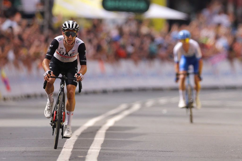 UAE Team Emirates British rider Adam Yates L cycles to the finish line to win ahead of his brother Team Jayco Alulas British rider Simon Yates placing second during the 1st stage of the 110th edition of the Tour de France cycling race 182 km departing and finishing in Bilbao in northern Spain on July 1 2023 Photo by Thomas SAMSON AFP Photo by THOMAS SAMSONAFP via Getty Images