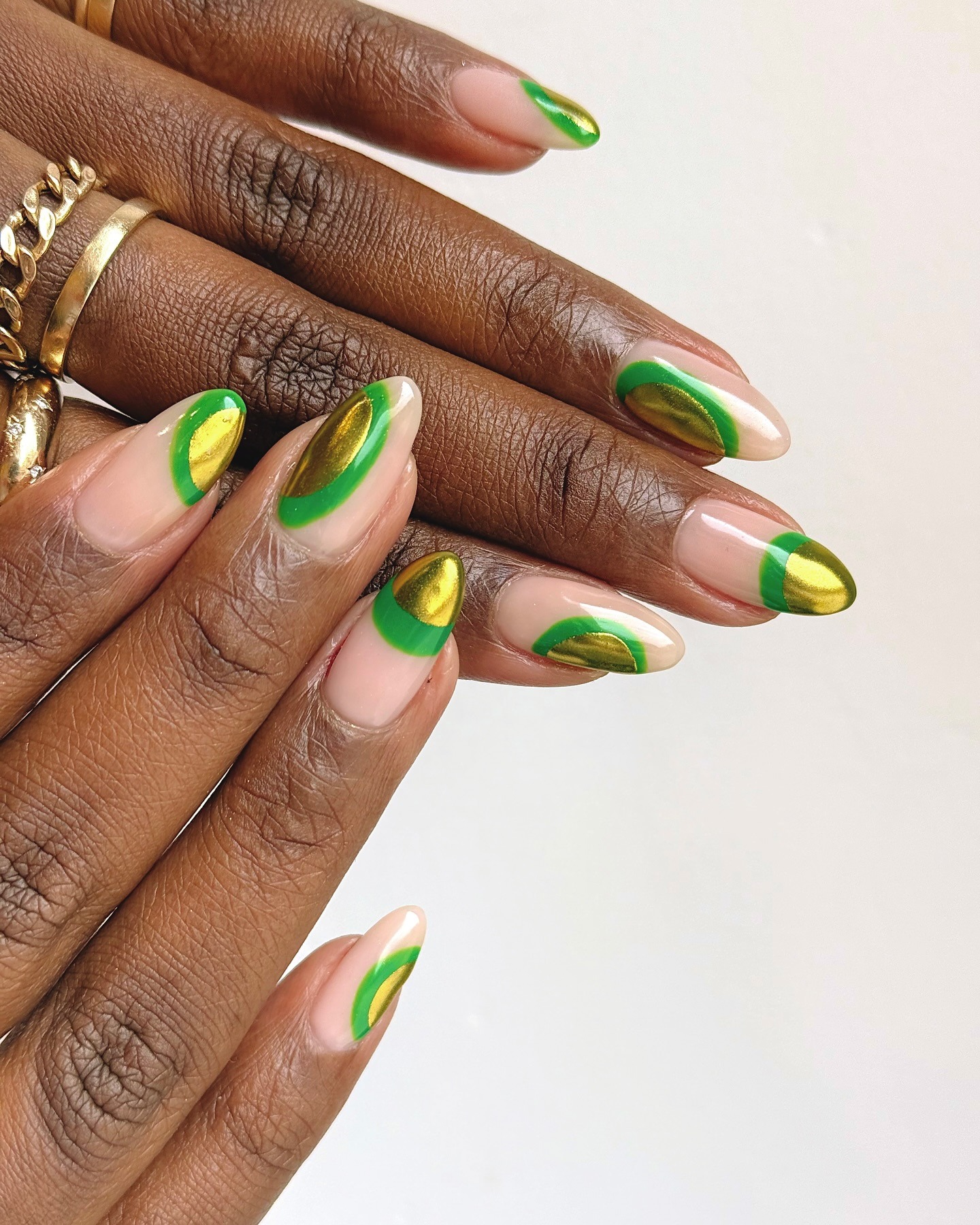 Nail art with gold glazed details.