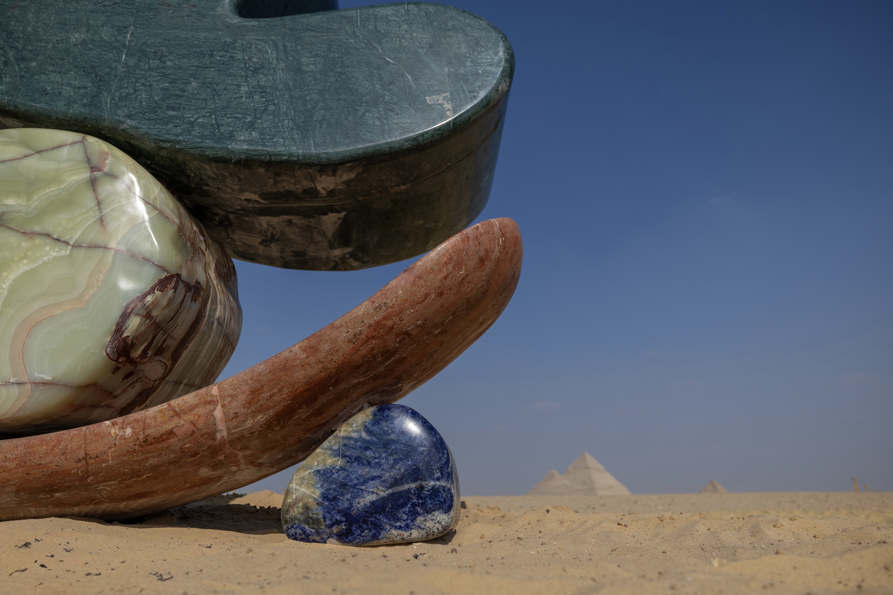 Giza Pyramids with colourful marble installation by Studio Proba