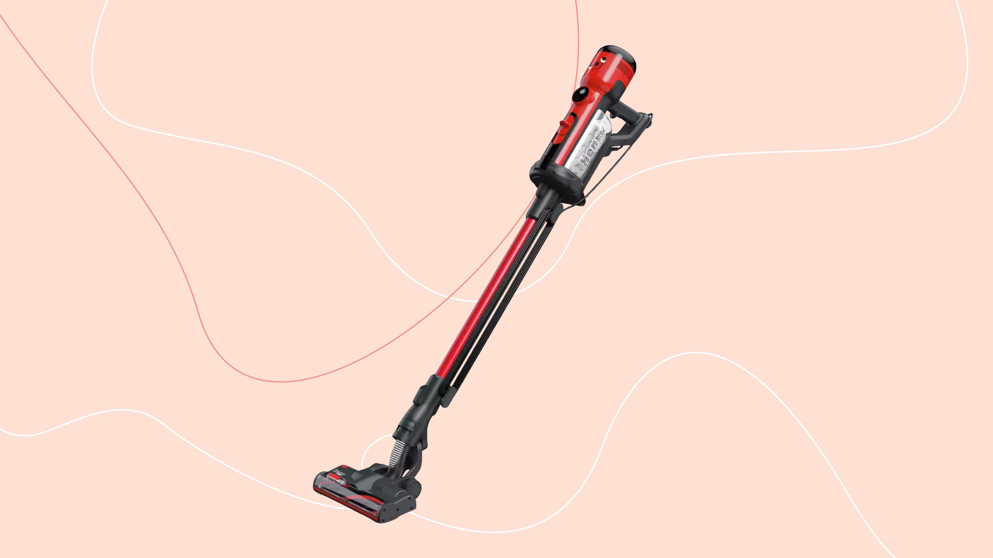 Henry Quick Corded Vacuum Cleaner on a pink background
