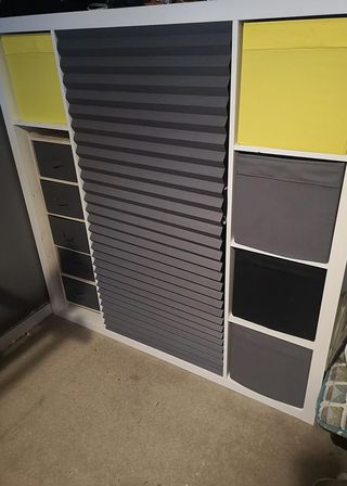 room with grey colour wardrobe