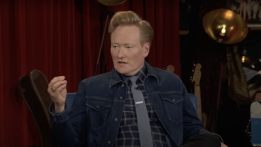 Conan O&#039;Brien seated and speaking for one of the final episodes of his TBS talk show