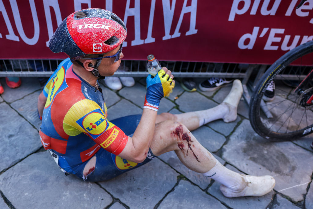 Toms Skujins of Latvia and Team Lidl - Trek hydrates at the end of the 18th Strade Bianche 2024