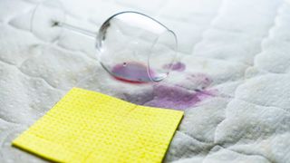 how to clean a mattress: fresh red wine spill
