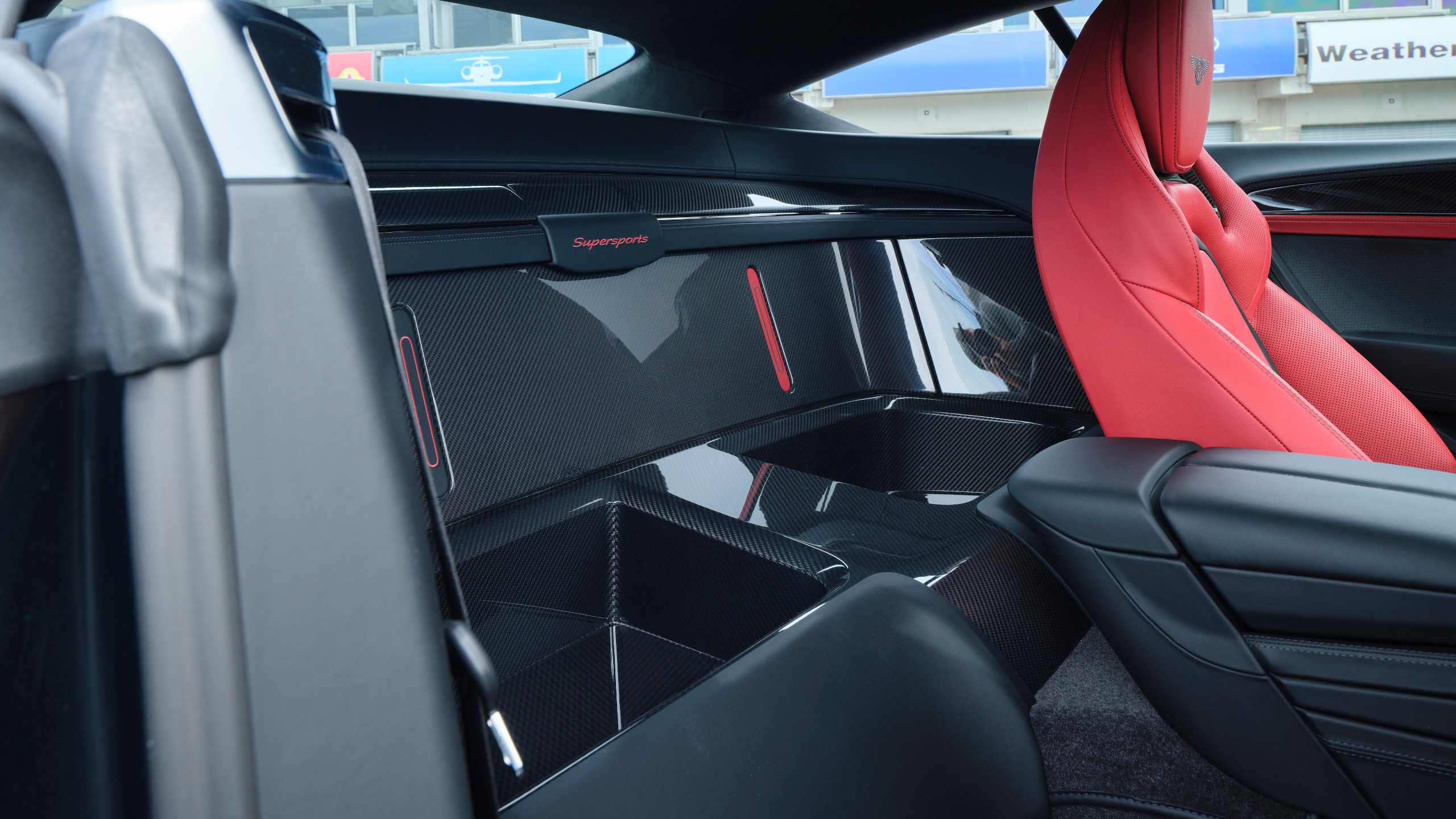 The rear seats have been replaced with a carbon fibre tub