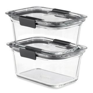 Two deep rectangle glass food containers with locking glass lids stacked on top of one another