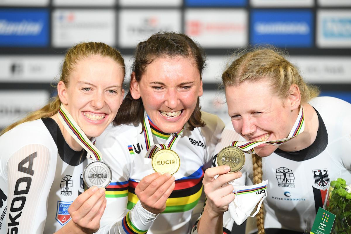 Picture by Simon Wilkinson/SWpix.com - 23/10/2021 - Cycling - Tissot 2021 UCI Track Cycling World Championships - Women's Individual Pursuit Finals - Stab Velodrome, Roubaix, France - Podium - Germany's Lisa Brennauer takes gold in the women's individual pursuit final with fellow countrywomen Franziska Brausse taking silver &amp; Mike Kroeger taking bronze.