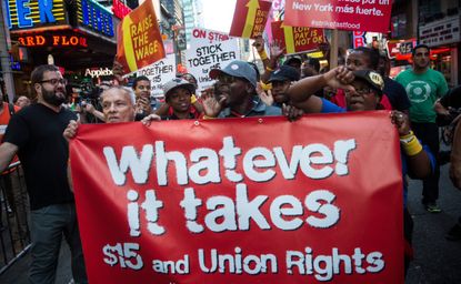 Protesters demand $15 an hour for fast food employees.