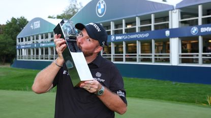 Shane Lowry kisses the BMW PGA Championship trophy