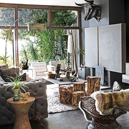Step inside a concrete Cape Town home full of lush foliage and luxe ...