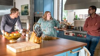 Justin Hartley, Chrissy Metz and Sterling K. Brown stand in a kitchen in This Is Us