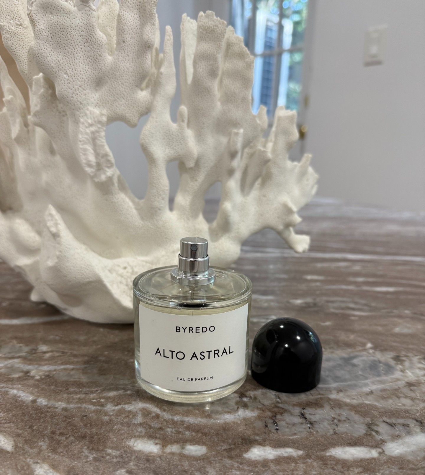 Jamie Schneider testing Byredo's Alto Astral perfume