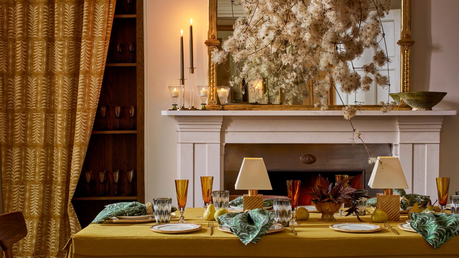 a neutral and ochre dining room decorated for new years eve with a dried flower mantel display