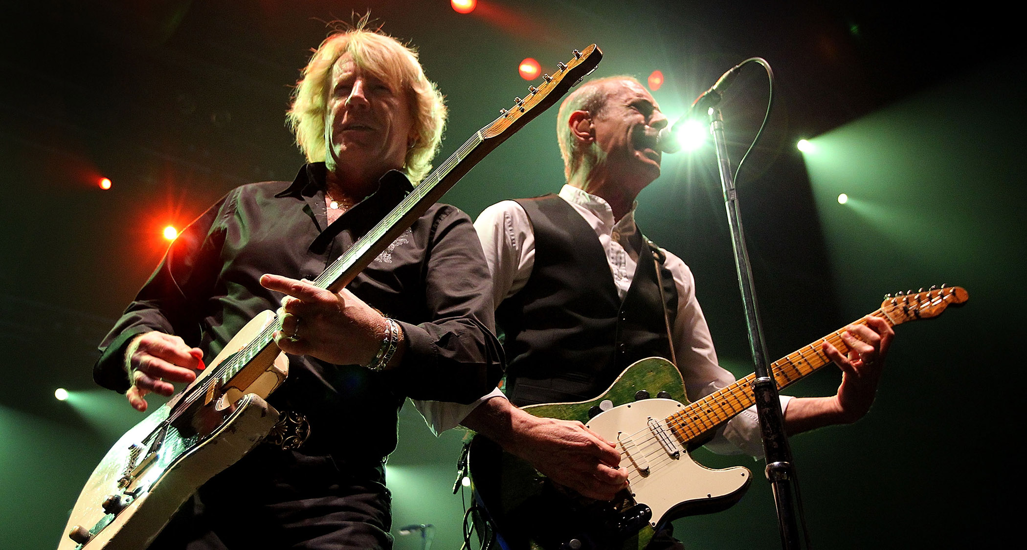 Rick Parfitt [left] and Francis Rossi give their Telecasters a good thrashing during a 2010 live performance in Perth, Australia.