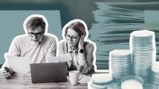 Couple concerned looking at finances on laptop