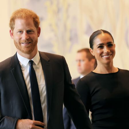 Prince Harry and Meghan Markle walk side by side