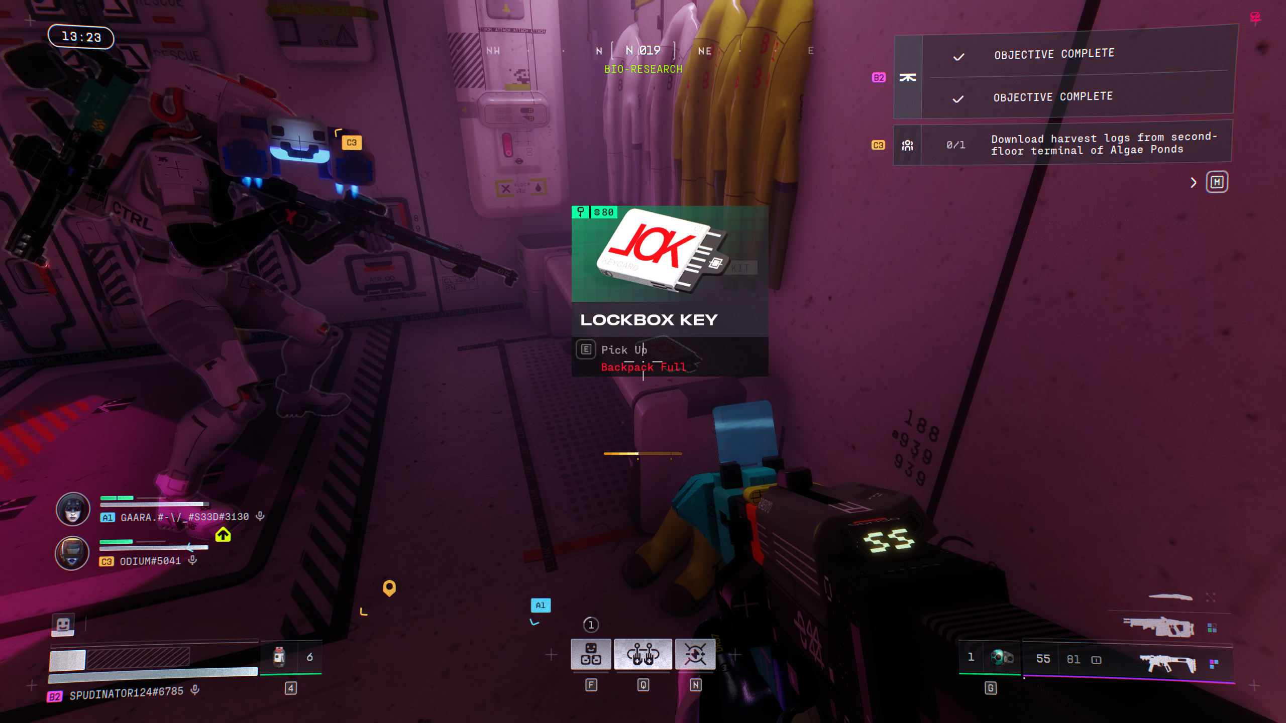 Marathon Lockbox Key: A player looking at a Lockbox Key placed on a bench in a lab.