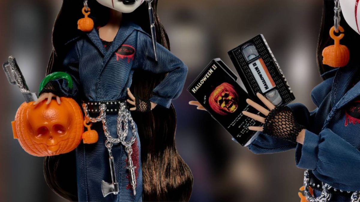 Close up of the details of the Monster High Michael Myers doll on top of a blurred background of the doll.