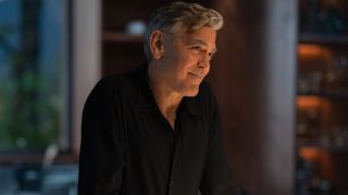 Jay (George Clooney) smiles in Jay Kelly.