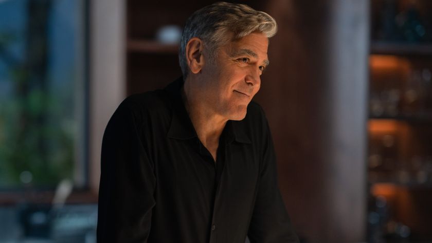 Jay (George Clooney) smiles in Jay Kelly.