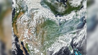 Imaging equipment aboard the NOAA-20 satellite captured this natural-color image of smoke over the U.S. Northeast on July 20, 2021.