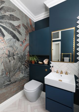 mural in dark blue bathroom