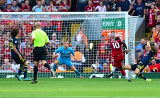 Sadio Mane, second right, shoots from the edge of the box